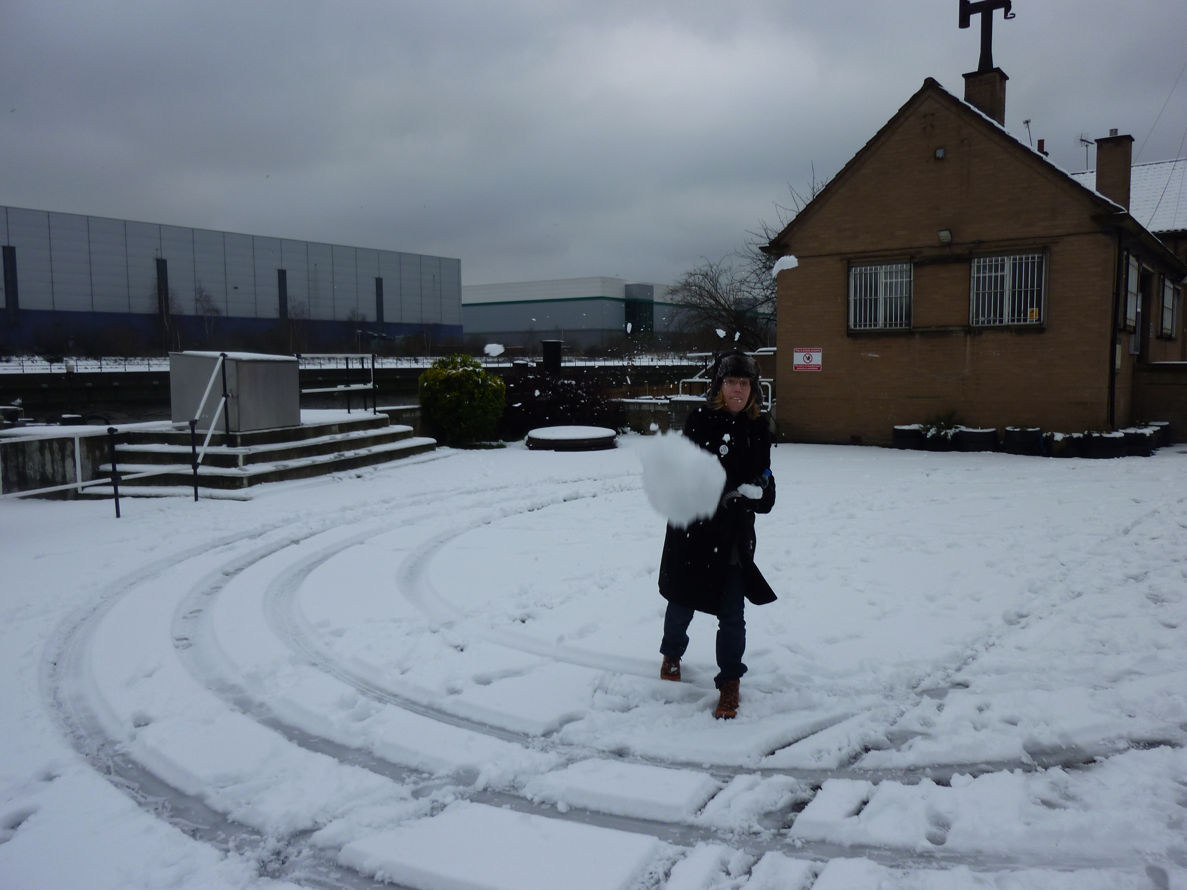 Justine throwing a snowball Justine throwing a snowball
